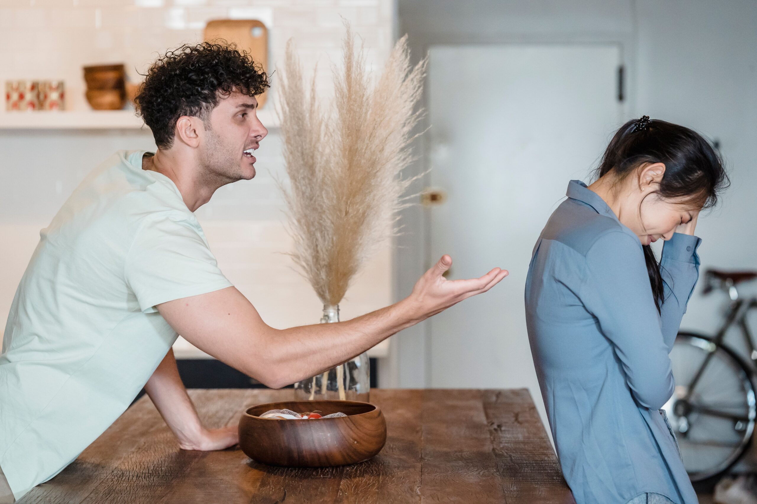 Man talking at woman